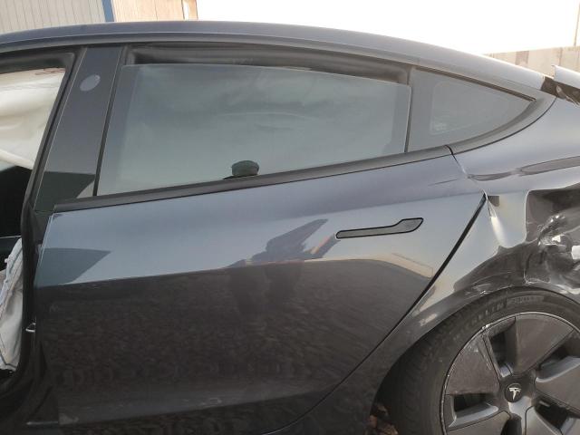 Photo 10 from auction – 2022 TESLA MODEL 3 with VIN 5YJ3E1EB8NF316320