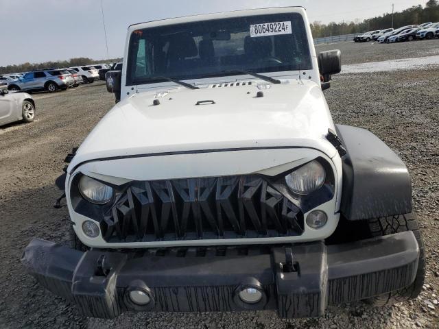 Photo 5 from auction – 2015 JEEP WRANGLER S with VIN 1C4AJWAG6FL502292
