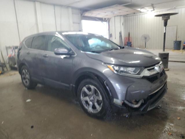 Photo 4 from auction – 2017 HONDA CR-V EXL with VIN 7FARW1H80HE011099
