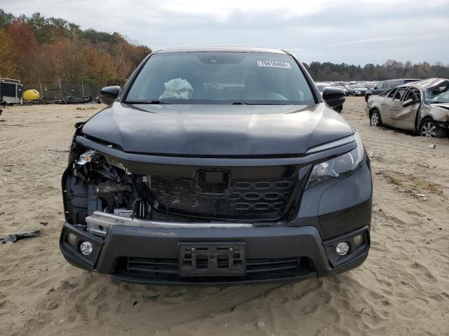 Photo 5 from auction – 2021 HONDA PASSPORT E with VIN 5FNYF8H51MB022404