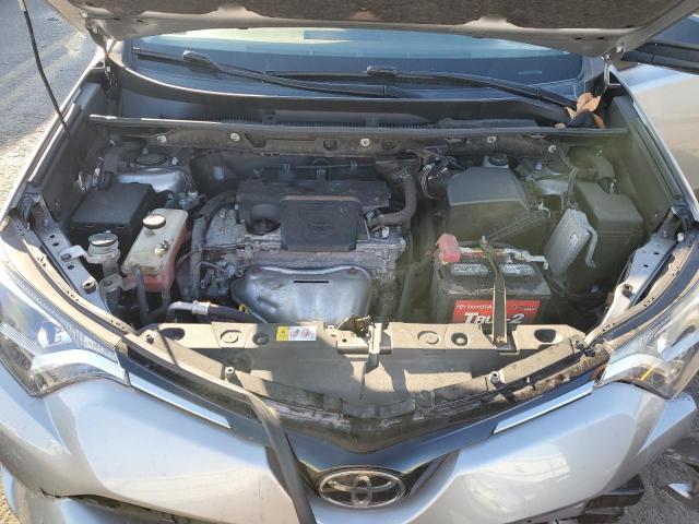 Photo 12 from auction – 2018 TOYOTA RAV4 LE with VIN JTMBFREV8JJ211197