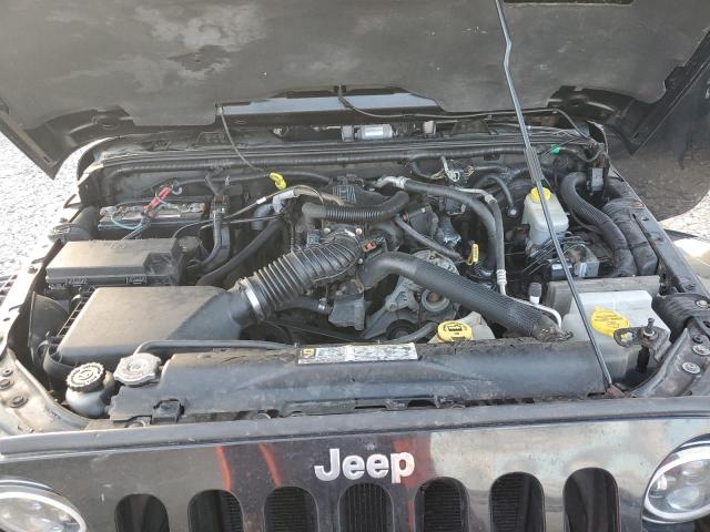 Photo 11 from auction – 2011 JEEP WRANGLER U with VIN 1J4BA5H19BL635410