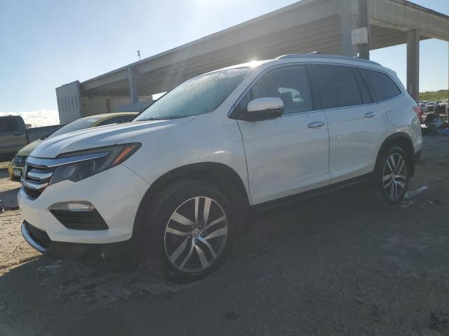 HONDA PILOT TOUR 2016 with VIN 5FNYF6H96GB040196 - Photo from auction
