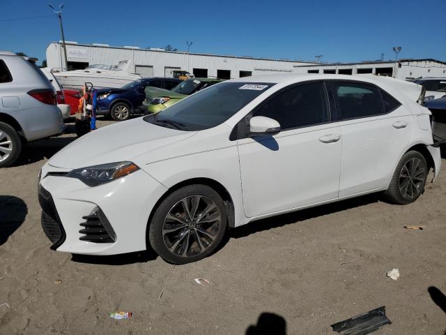 TOYOTA COROLLA L 2018 with VIN 2T1BURHE9JC023608 - Photo from auction