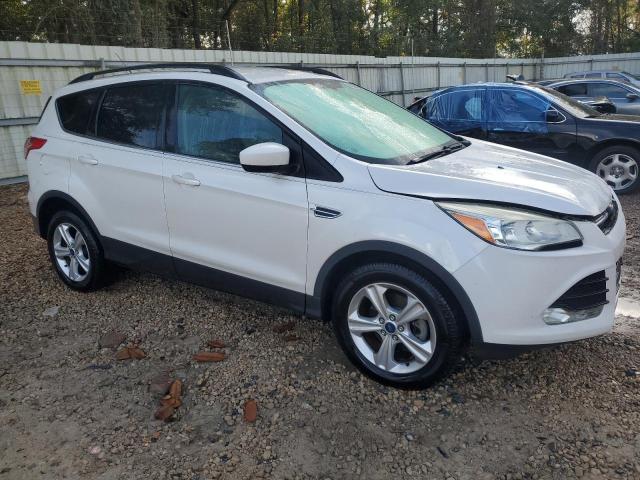 Photo 4 from auction – 2014 FORD ESCAPE SE with VIN 1FMCU0GX6EUD92059