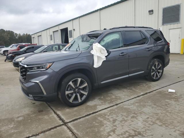 HONDA PILOT ELIT 2024 with VIN 5FNYG1H81RB004233 - Photo from auction