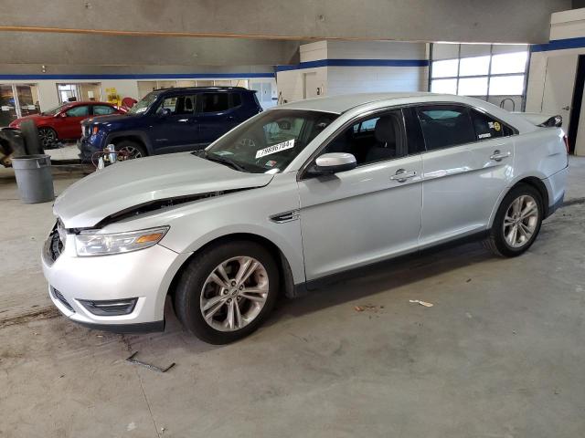 FORD TAURUS SEL 2014 with VIN 1FAHP2E85EG148125 - Photo from auction