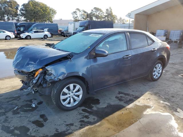 TOYOTA COROLLA L 2015 with VIN 5YFBURHE4FP326173 - Photo from auction