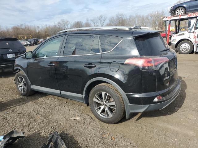 Photo 2 from auction – 2017 TOYOTA RAV4 XLE with VIN 2T3RFREV2HW659378