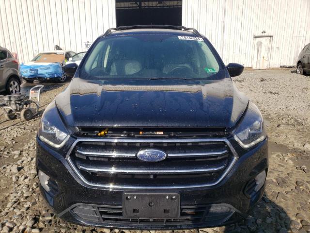 Photo 5 from auction – 2018 FORD ESCAPE SE with VIN 1FMCU9GD4JUC25574