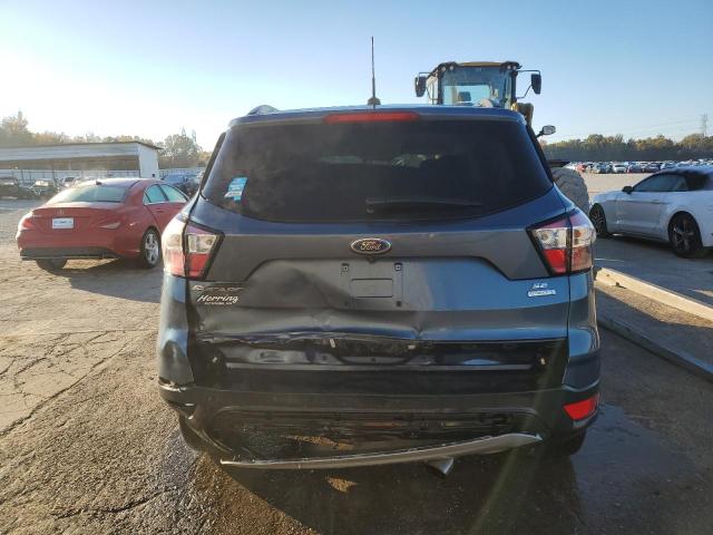 Photo 6 from auction – 2018 FORD ESCAPE SE with VIN 1FMCU0GD2JUC02810