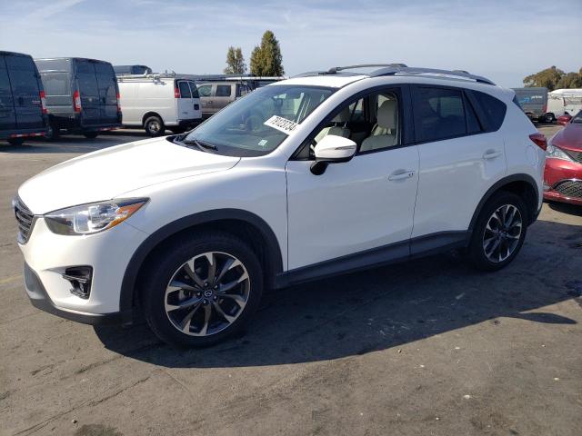 MAZDA CX-5 GT 2016 with VIN JM3KE2DY8G0763570 - Photo from auction