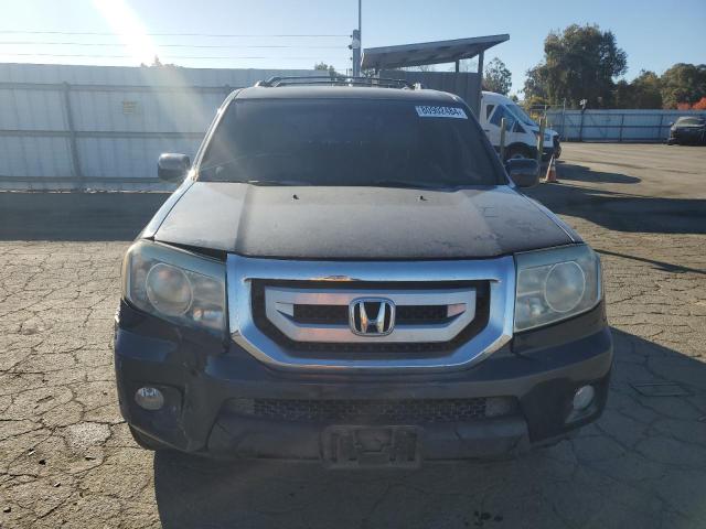 Photo 5 from auction – 2011 HONDA PILOT TOUR with VIN 5FNYF4H97BB024831