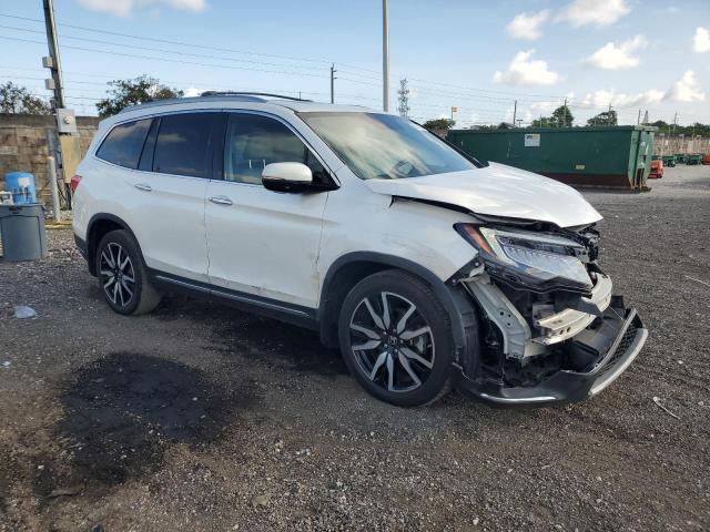 Photo 4 from auction – 2019 HONDA PILOT ELIT with VIN 5FNYF6H00KB037871