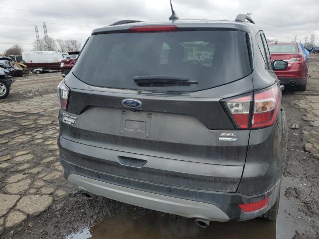 Photo 6 from auction – 2018 FORD ESCAPE SEL with VIN 1FMCU9HD2JUC80197