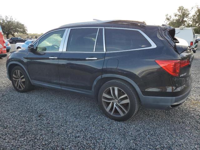 Photo 2 from auction – 2016 HONDA PILOT ELIT with VIN 5FNYF6H08GB034482