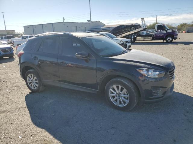 Photo 4 from auction – 2016 MAZDA CX-5 SPORT with VIN JM3KE2BYXG0791986