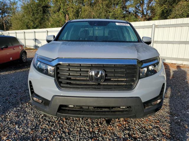 Photo 5 from auction – 2023 HONDA RIDGELINE with VIN 5FPYK3F55PB018305