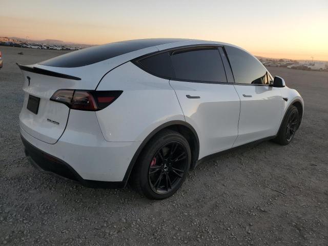 Photo 3 from auction – 2021 TESLA MODEL Y with VIN 5YJYGDEE4MF254621