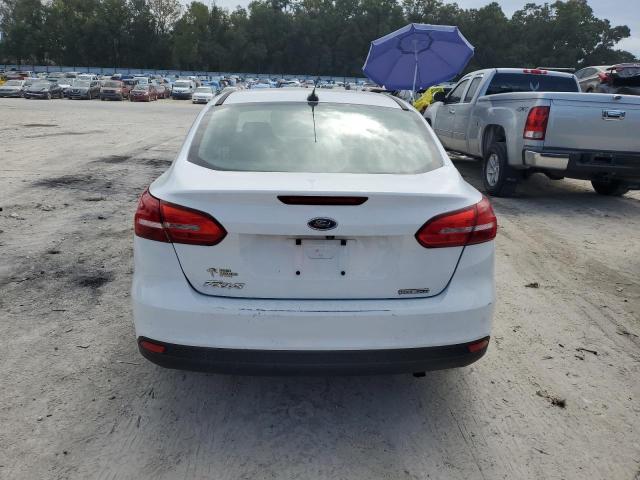 Photo 6 from auction – 2015 FORD FOCUS S with VIN 1FADP3E24FL270418