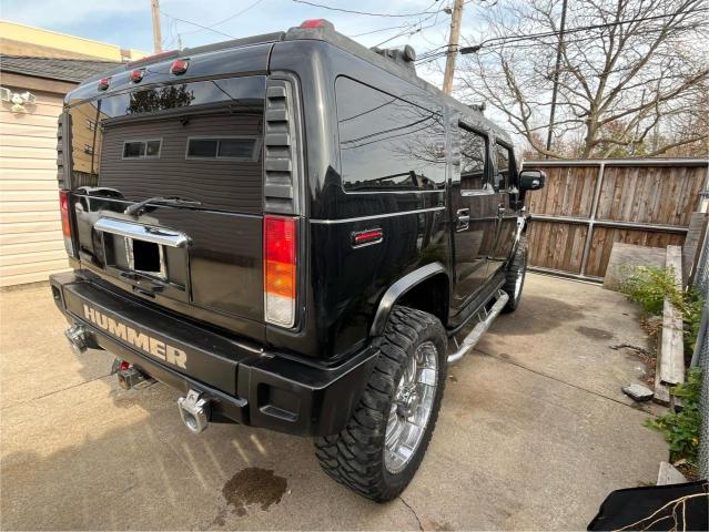 Photo 4 from auction – 2004 HUMMER H2 with VIN 5GRGN23U14H115951