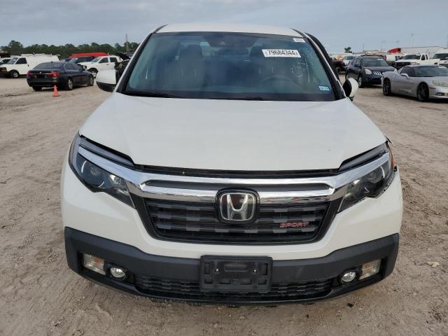 Photo 5 from auction – 2020 HONDA RIDGELINE with VIN 5FPYK3F13LB014518