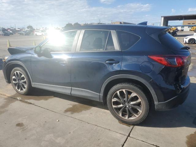 Photo 2 from auction – 2016 MAZDA CX-5 GT with VIN JM3KE2DY1G0821843