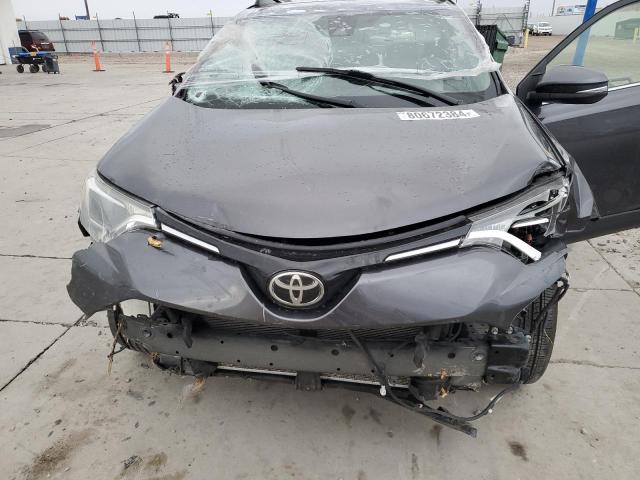 Photo 11 from auction – 2017 TOYOTA RAV4 XLE with VIN JTMRFREVXHJ124846