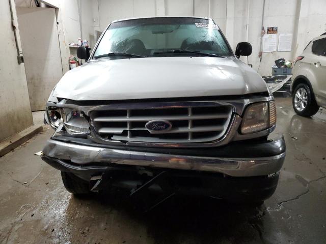 Photo 5 from auction – 1999 FORD F150 with VIN 1FTRX18L8XNA69894