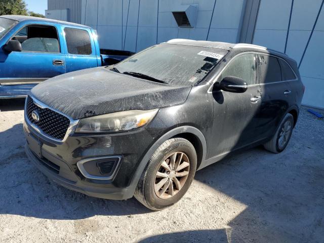 KIA SORENTO LX 2016 with VIN 5XYPG4A51GG002243 - Photo from auction