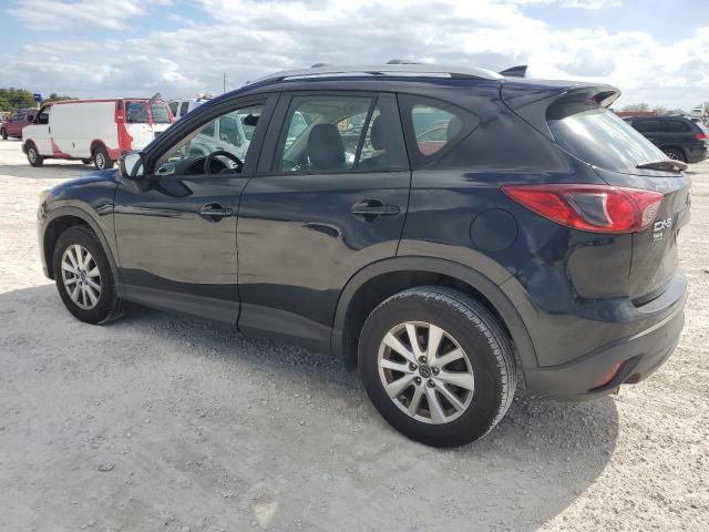 Photo 2 from auction – 2016 MAZDA CX-5 SPORT with VIN JM3KE2BE9G0609930