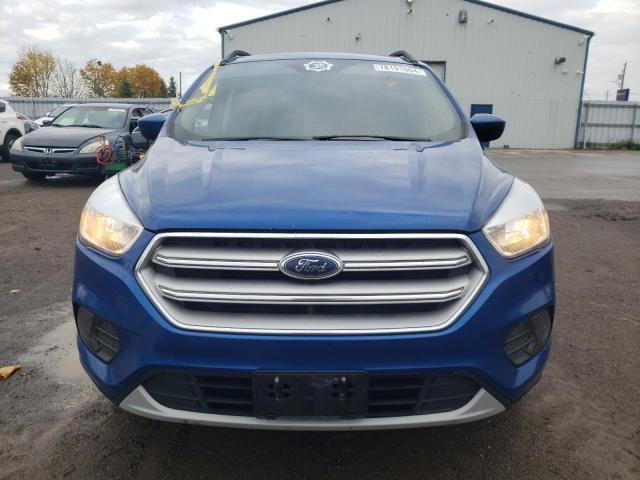 Photo 5 from auction – 2018 FORD ESCAPE SE with VIN 1FMCU9GDXJUC95547