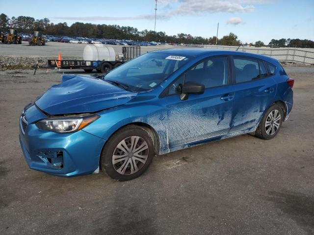 SUBARU IMPREZA 2019 with VIN 4S3GTAA67K3754853 - Photo from auction
