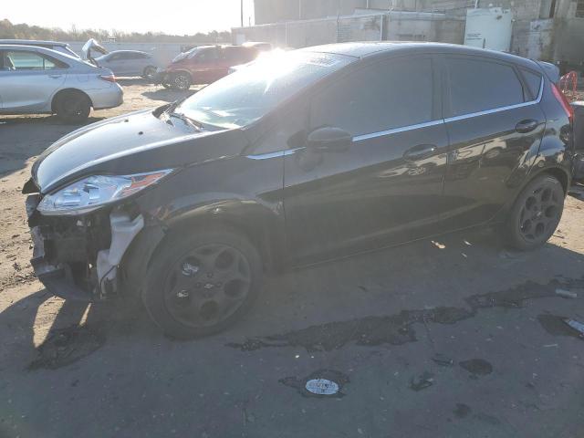 FORD FIESTA SES 2011 with VIN 3FADP4FJ2BM174890 - Photo from auction