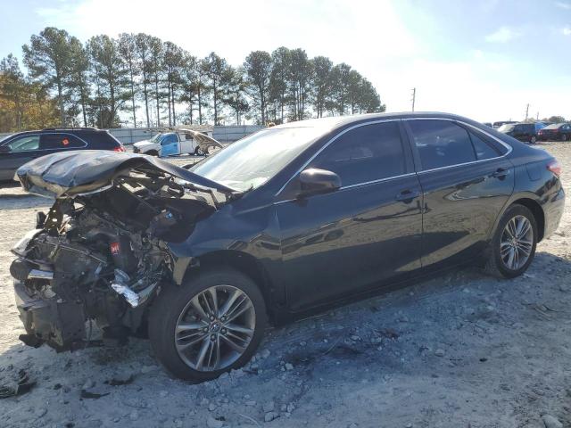 TOYOTA CAMRY LE 2017 with VIN 4T1BF1FK8HU718028 - Photo from auction