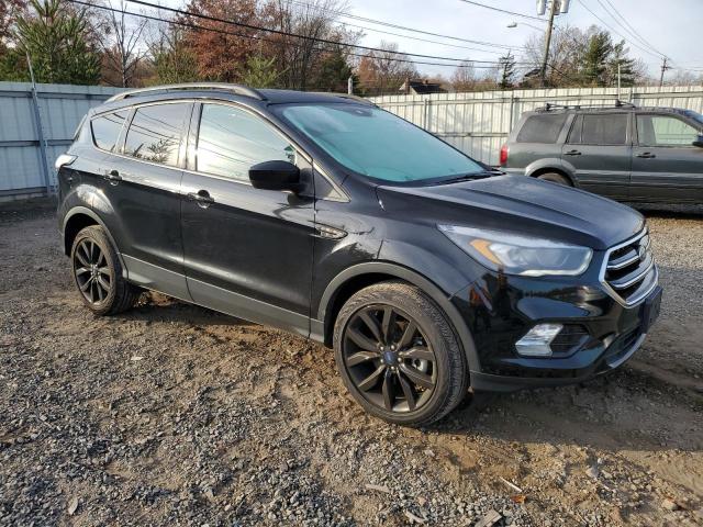 Photo 4 from auction – 2018 FORD ESCAPE SE with VIN 1FMCU9GD1JUD46255