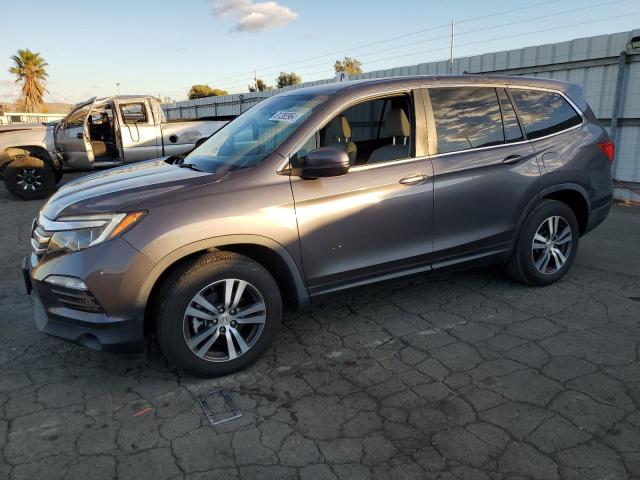 HONDA PILOT EXL 2018 with VIN 5FNYF6H52JB071675 - Photo from auction