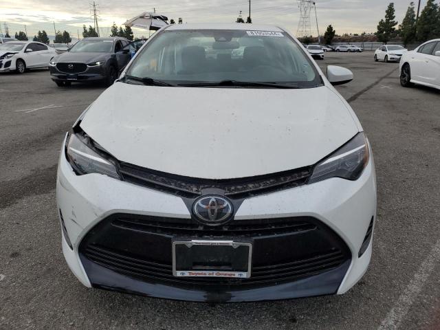 Photo 5 from auction – 2018 TOYOTA COROLLA L with VIN 5YFBURHE5JP799976