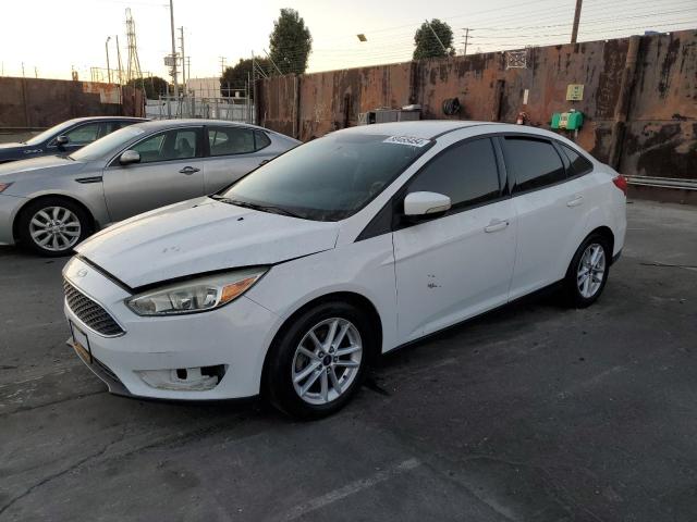 FORD FOCUS SE 2015 with VIN 1FADP3F21FL261996 - Photo from auction