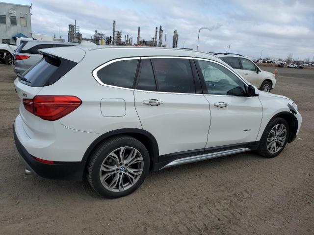 Photo 3 from auction – 2016 BMW X1 XDRIVE2 with VIN WBXHT3C36G5E47551