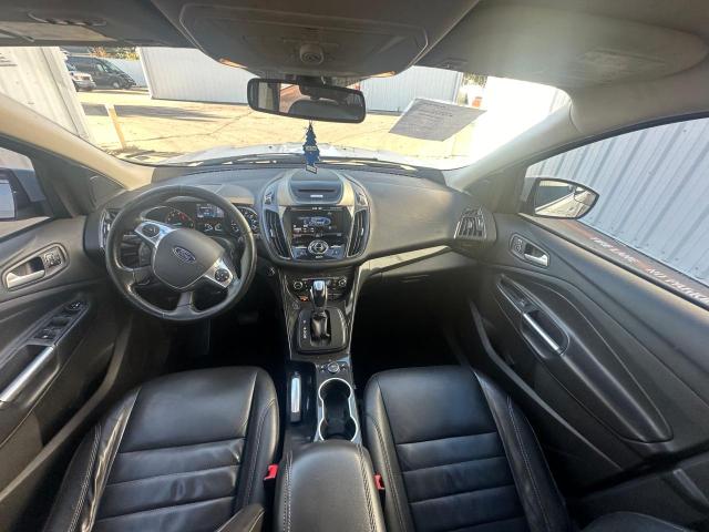Photo 9 from auction – 2015 FORD ESCAPE TIT with VIN 1FMCU0JX3FUC43568