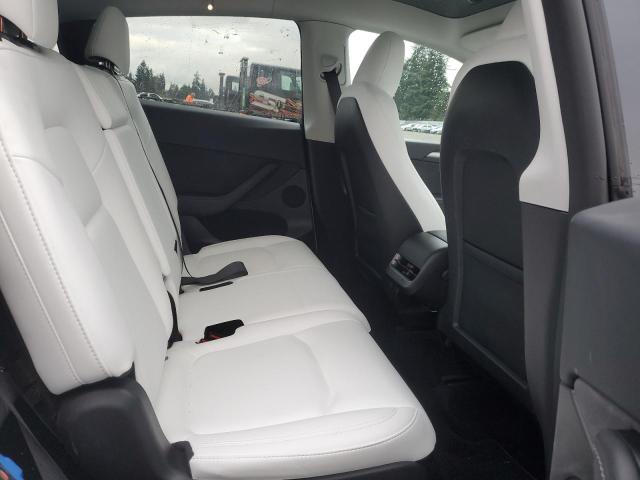 Photo 11 from auction – 2023 TESLA MODEL Y with VIN 7SAYGAEE3PF811654