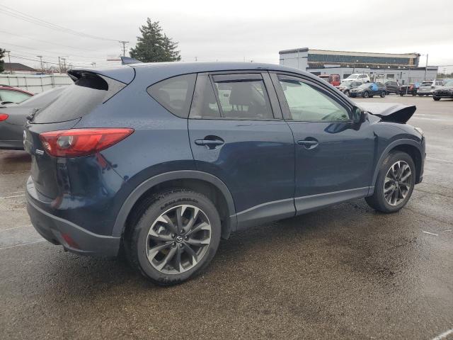 Photo 3 from auction – 2016 MAZDA CX-5 GT with VIN JM3KE4DYXG0695381