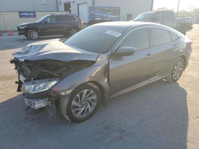 Photo 1 from auction – 2017 HONDA CIVIC EX with VIN 19XFC2F7XHE056323