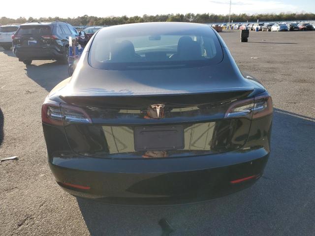 Photo 6 from auction – 2022 TESLA MODEL 3 with VIN 5YJ3E1EAXNF352582