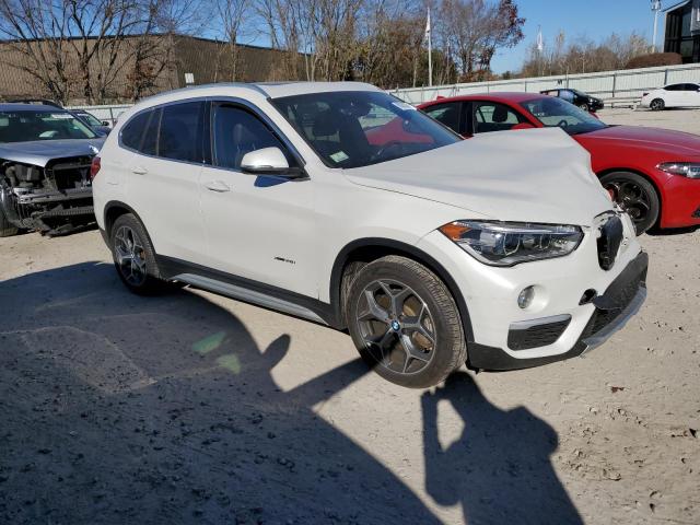 Photo 4 from auction – 2017 BMW X1 XDRIVE2 with VIN WBXHT3C36H5F78075
