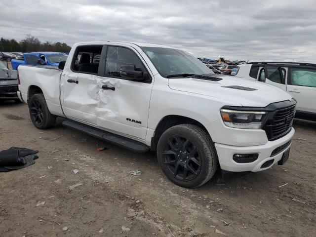 Photo 4 from auction – 2023 RAM 1500 LARAM with VIN 1C6SRFRT7PN568331