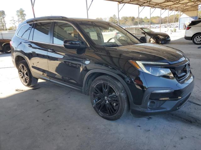 Photo 4 from auction – 2022 HONDA PILOT LX with VIN 5FNYF6H28NB095863