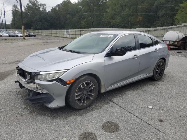 HONDA CIVIC LX 2017 with VIN 19XFC2F52HE002111 - Photo from auction