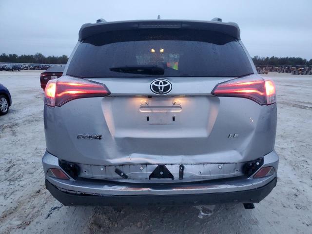 Photo 6 from auction – 2018 TOYOTA RAV4 LE with VIN JTMZFREV2JD111593